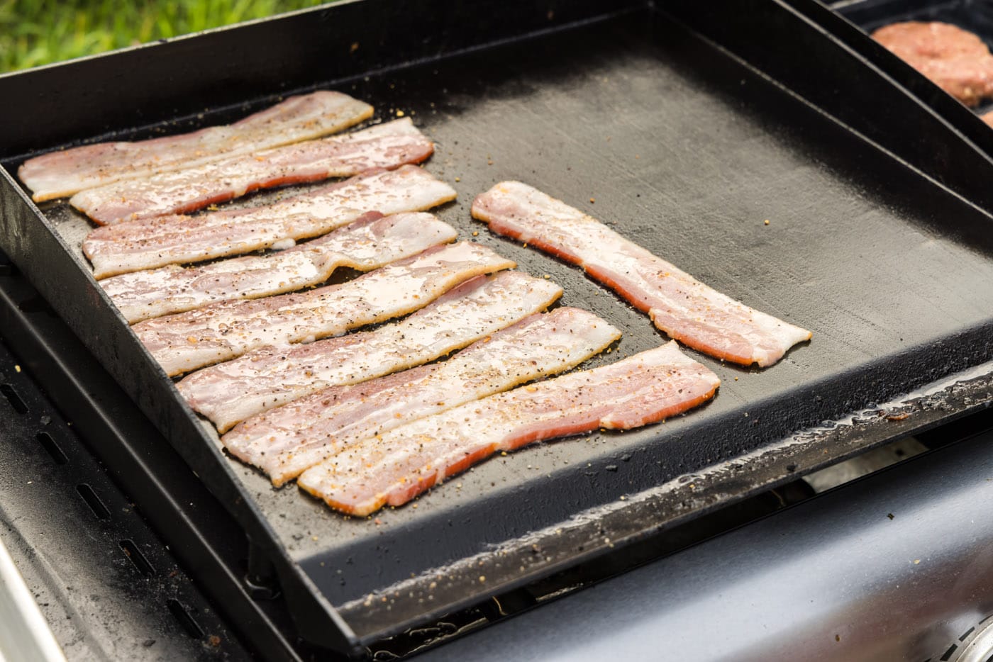 cooking bacon on the grill