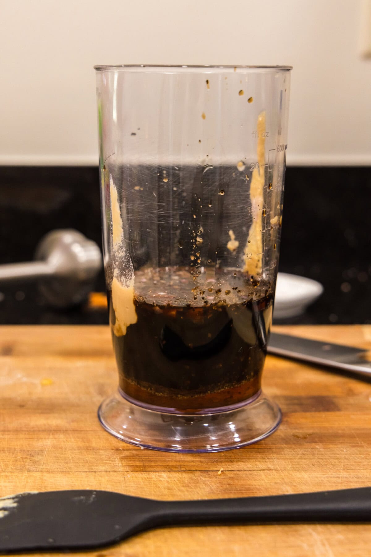 balsamic vinaigrette dressing ingredients in an immersion blender