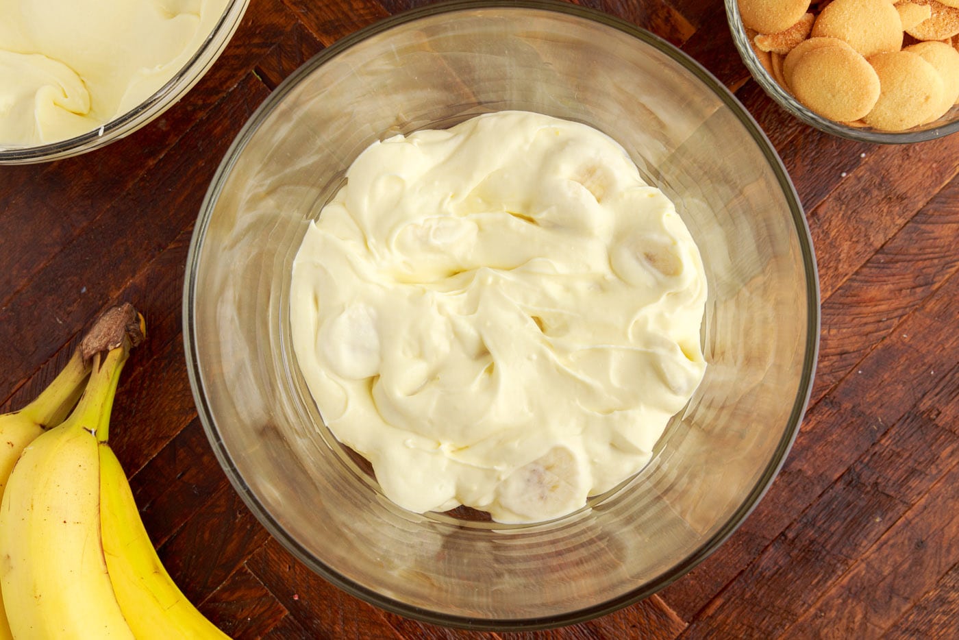 cream cheese banana pudding mixture in a trifle bowl