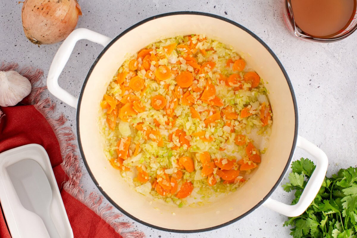lightly cooked vegetables in a soup pot