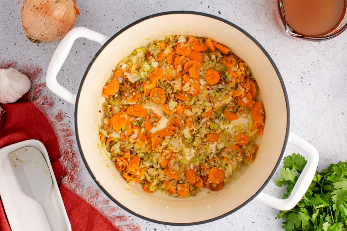 seasoned vegetables in a soup pot