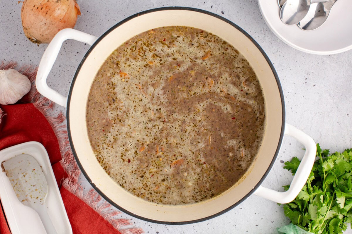 creamy and rich black bean soup in a pot
