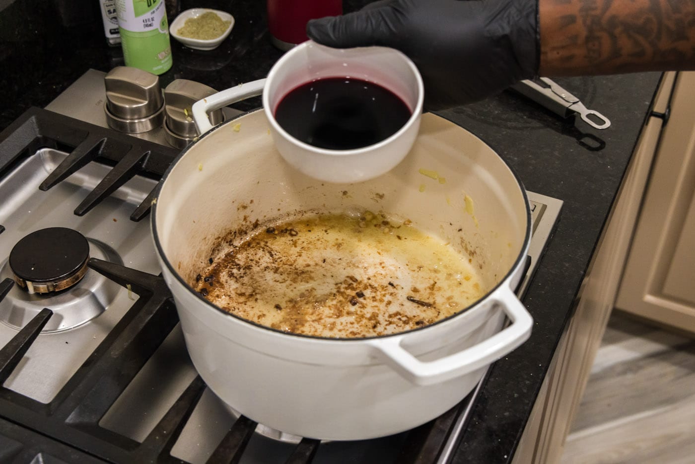 adding red wine to dutch oven
