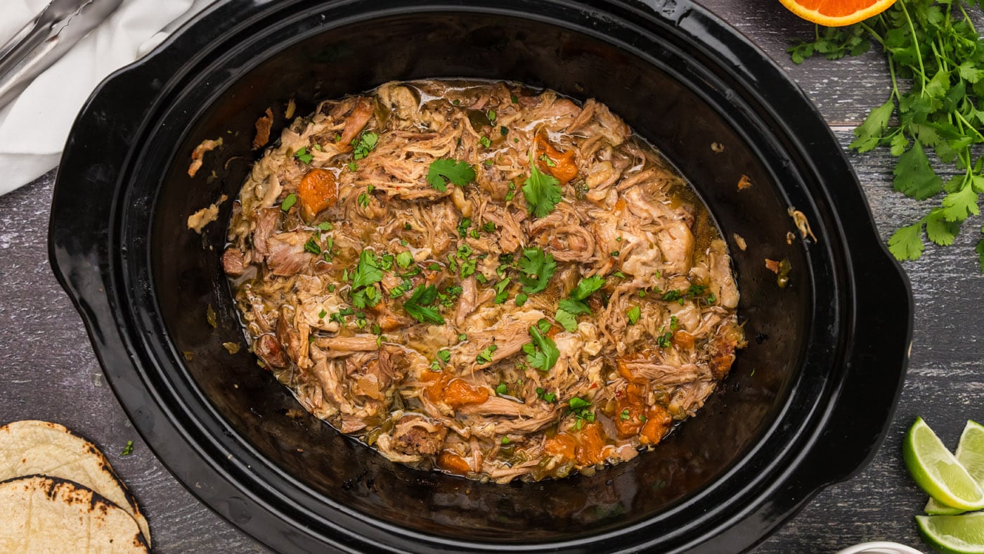Quick, easy, and intensely flavorful carnitas made right in the slow cooker. Perfectly tender, shred