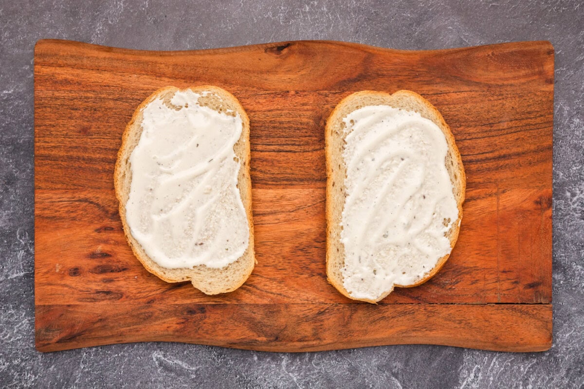 ranch dressing spread on rye bread slices