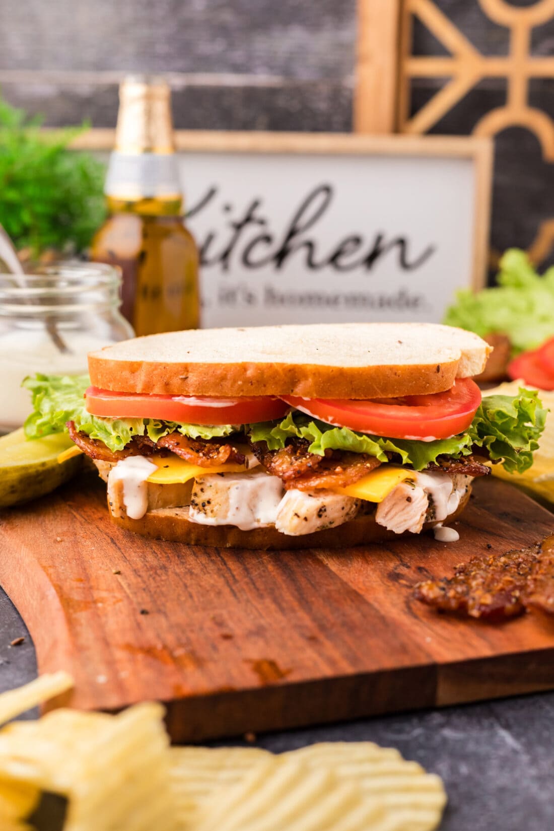 Chicken Bacon Ranch Sandwich on a wooden serving tray