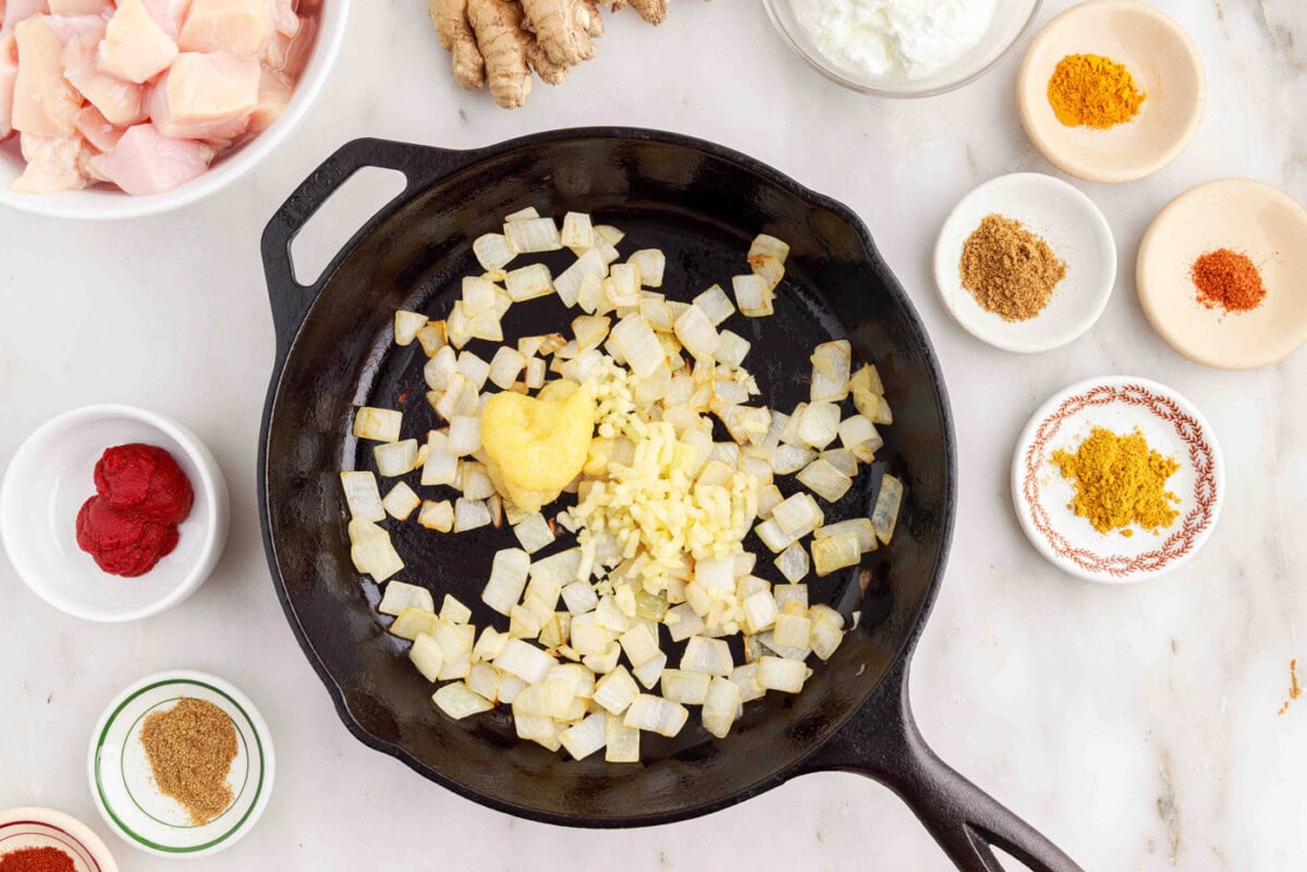 garlic, ginger, and onion in a skillet
