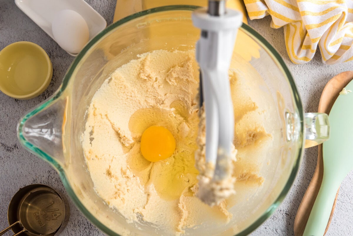 adding eggs to butter mixture