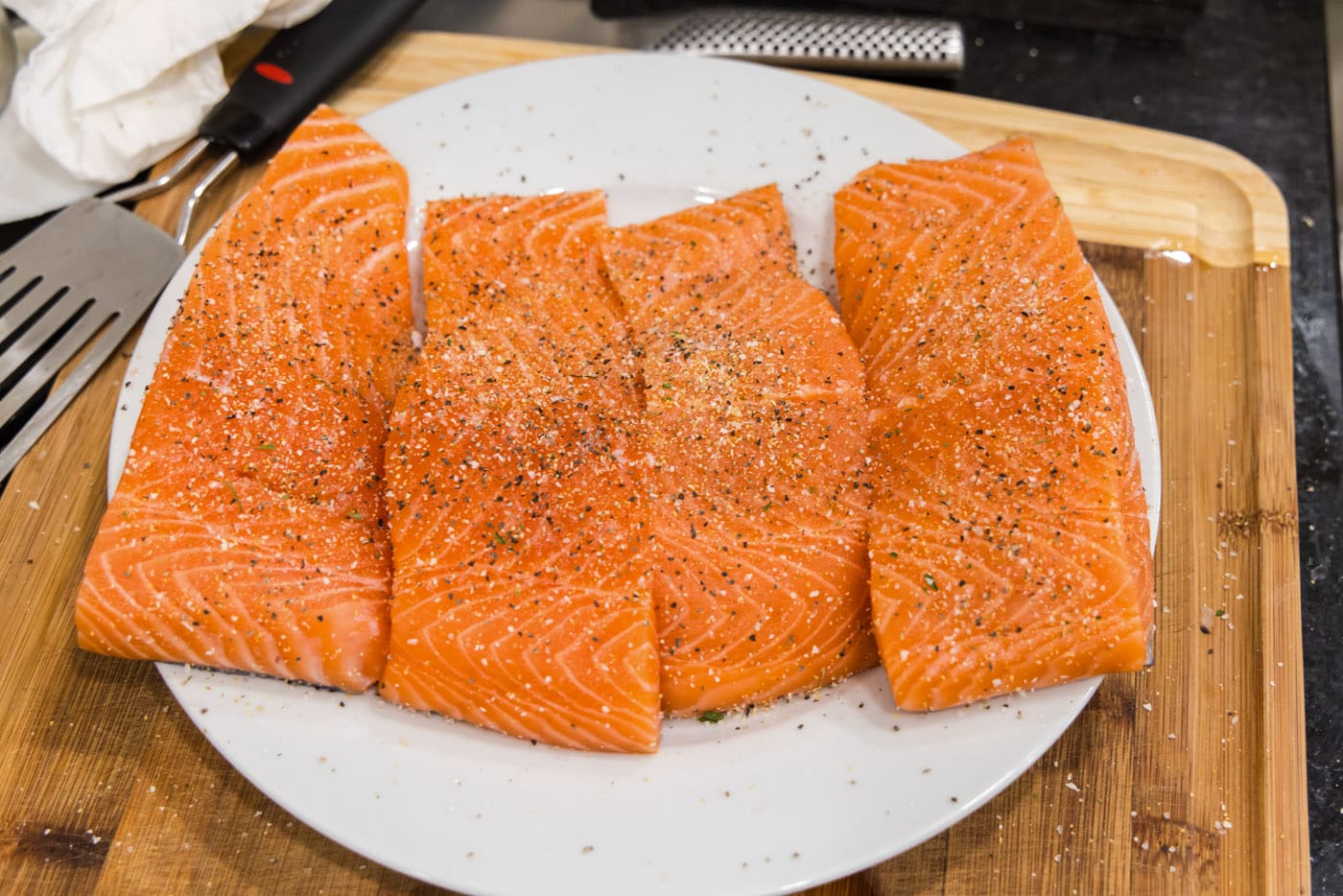 seasoned salmon filets on a plate