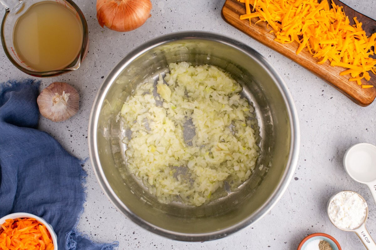 melted butter and onions in an instant pot