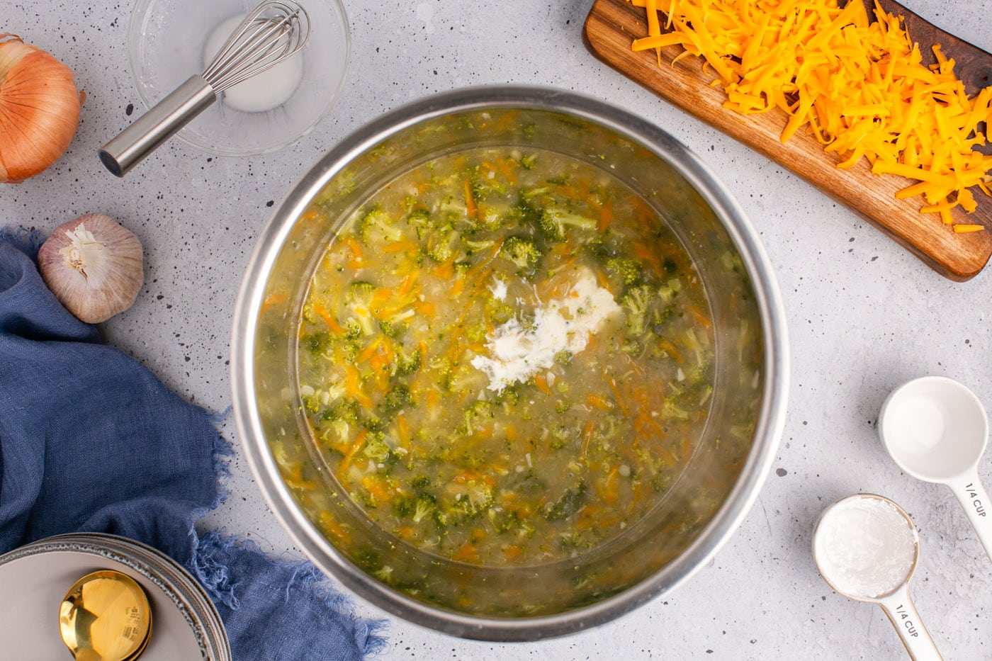 adding cornstarch slurry to broccoli cheddar soup to thicken