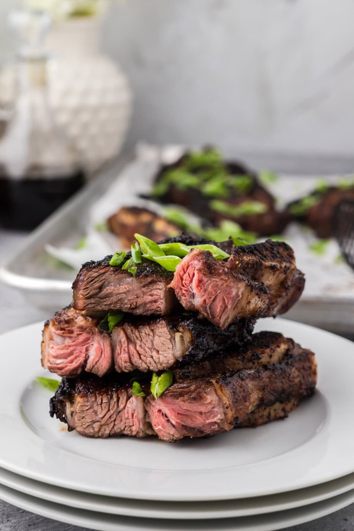 Stack of cut Korean Short Ribs on a plate