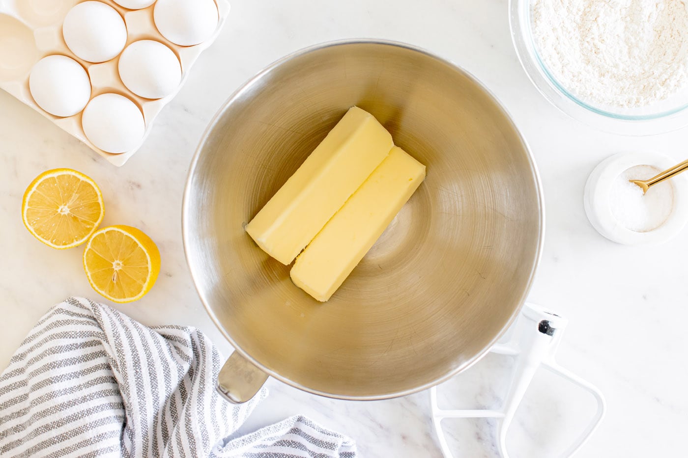 two sticks of butter in a stand mixer bowl