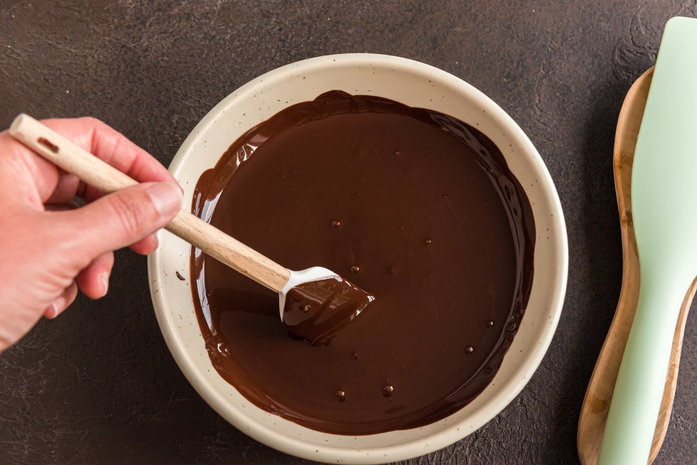 melted dark chocolate in a bowl