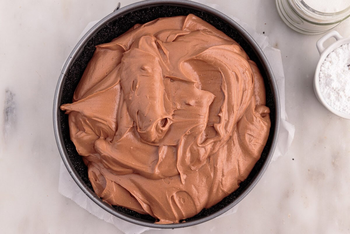 chocolate cheesecake mixture in a springform pan