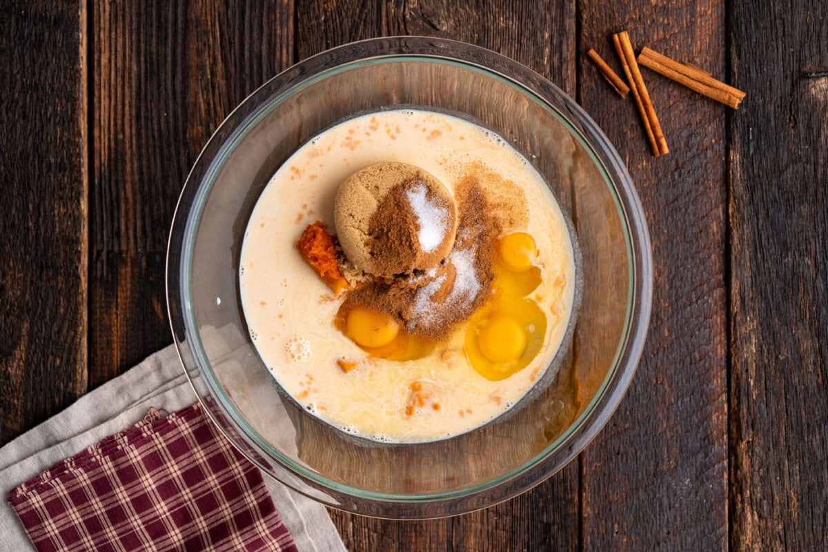 eggs, sugar, and pumpkin puree in a bowl