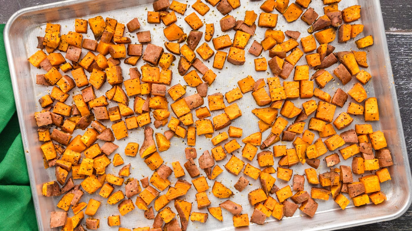 Roasted sweet potatoes crisp caramelized exterior is met with a tender, melt-in-your-mouth interior 