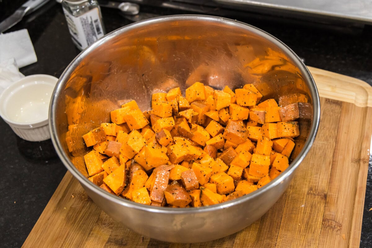 cubed sweet potatoes tossed in olive oil and seasonings
