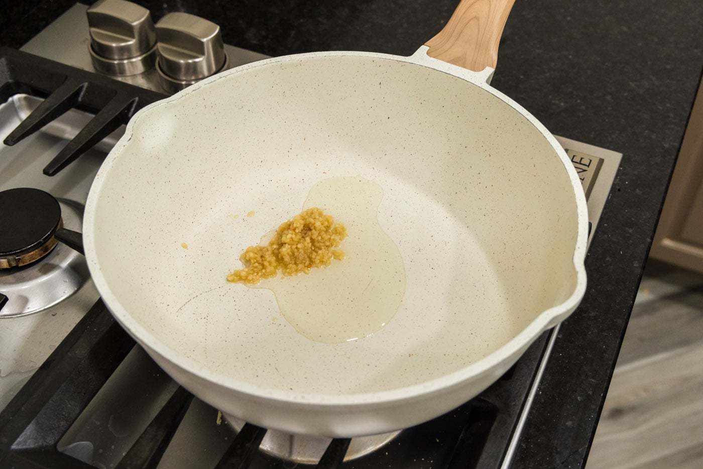 minced garlic and oil in a large skillet