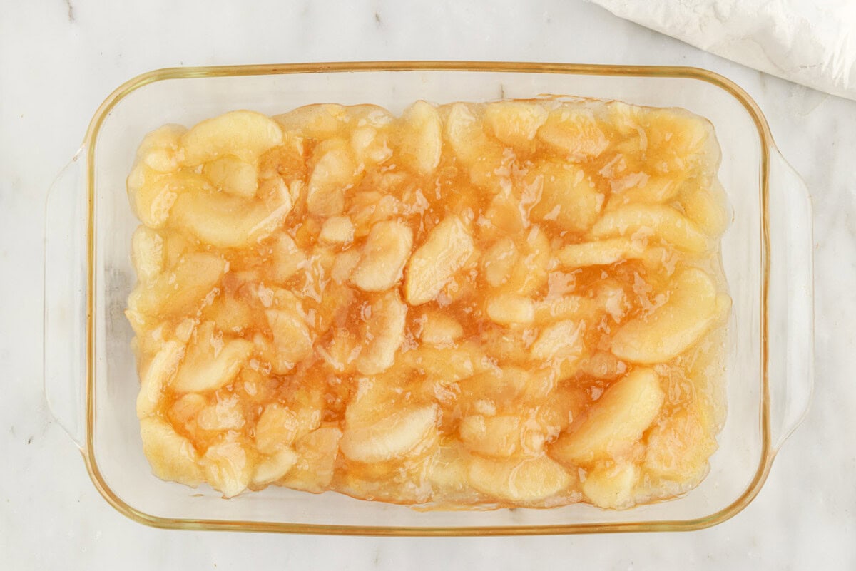 apple pie filling in a glass baking dish