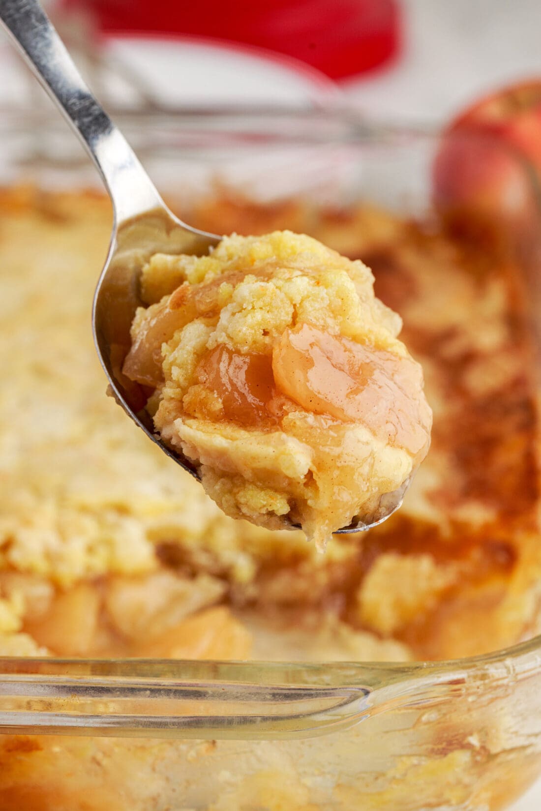 Close up photo of a spoonful of Apple Dump Cake