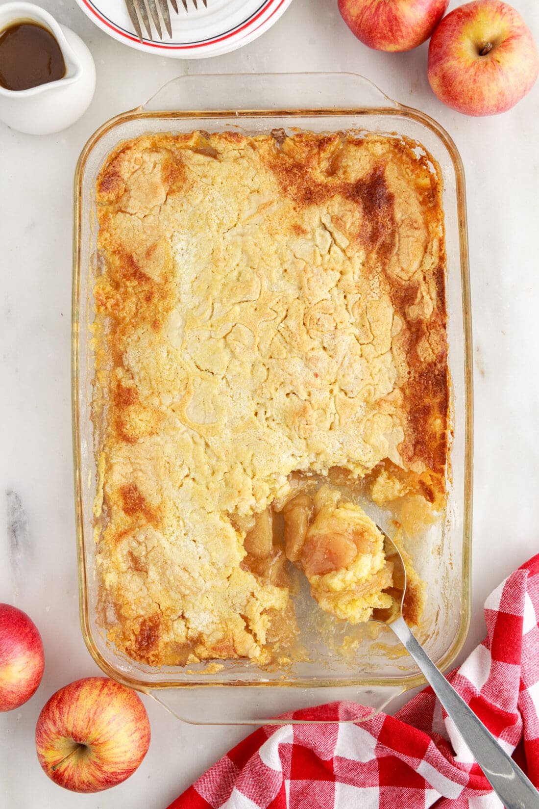 Pan of Apple Dump Cake with a spoon in it