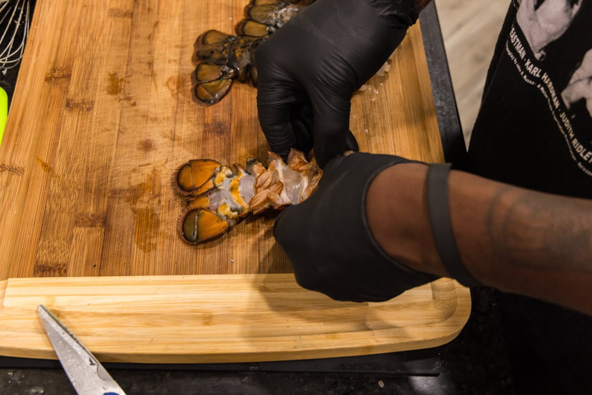 spreading open lobster shell