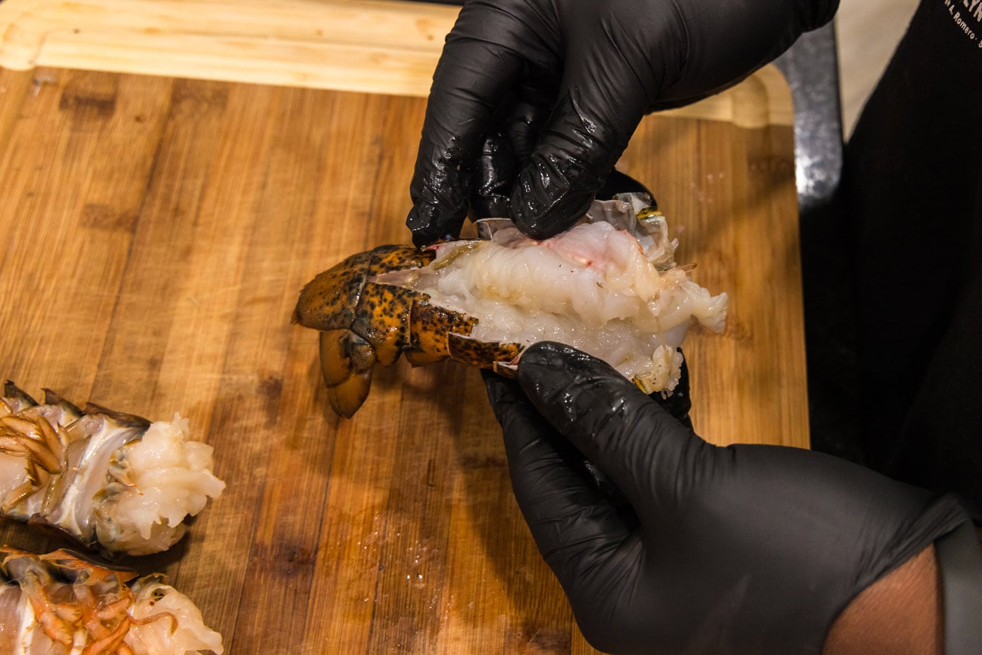 exposing meat from lobster shell