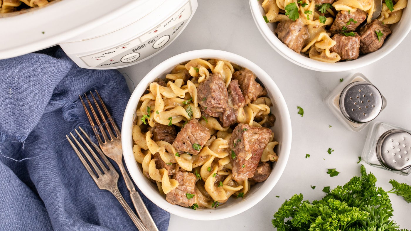 Slow cooked beef stew meat meets a super simple brown gravy with the addition of hearty pasta in thi