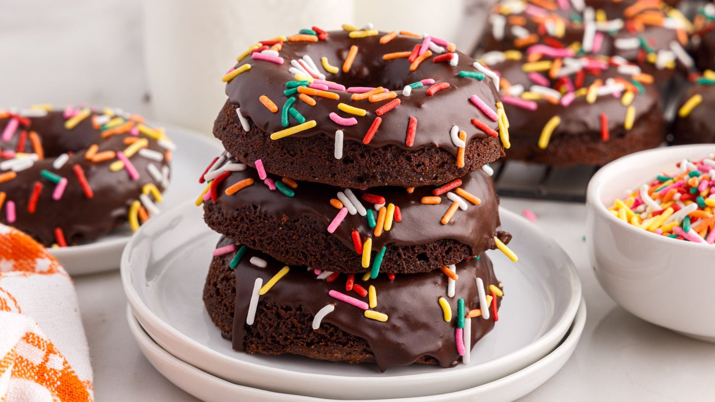 Rich chocolatey decadence packed into a classic donut-shaped pastry decked out with sprinkles and ch