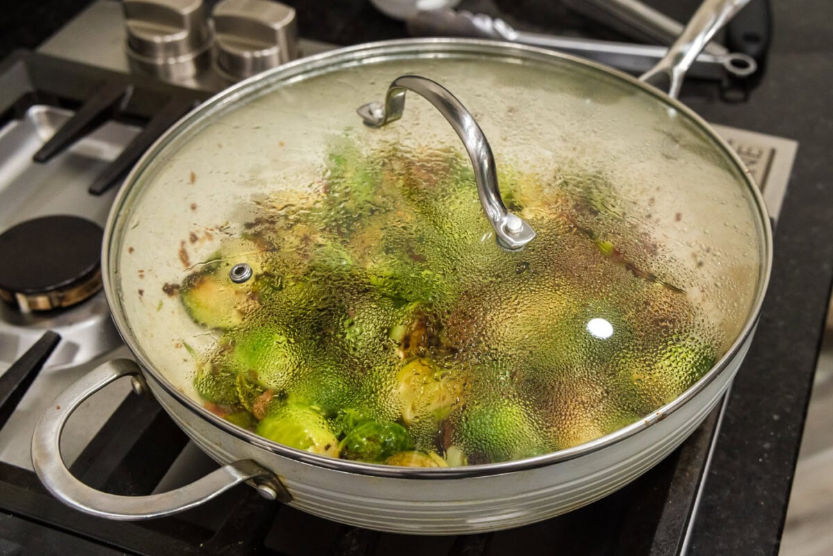 cooking brussels sprouts with bacon, shallots, and candied pecans