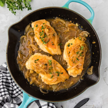 Chicken with Onion Thyme Sauce in a skillet