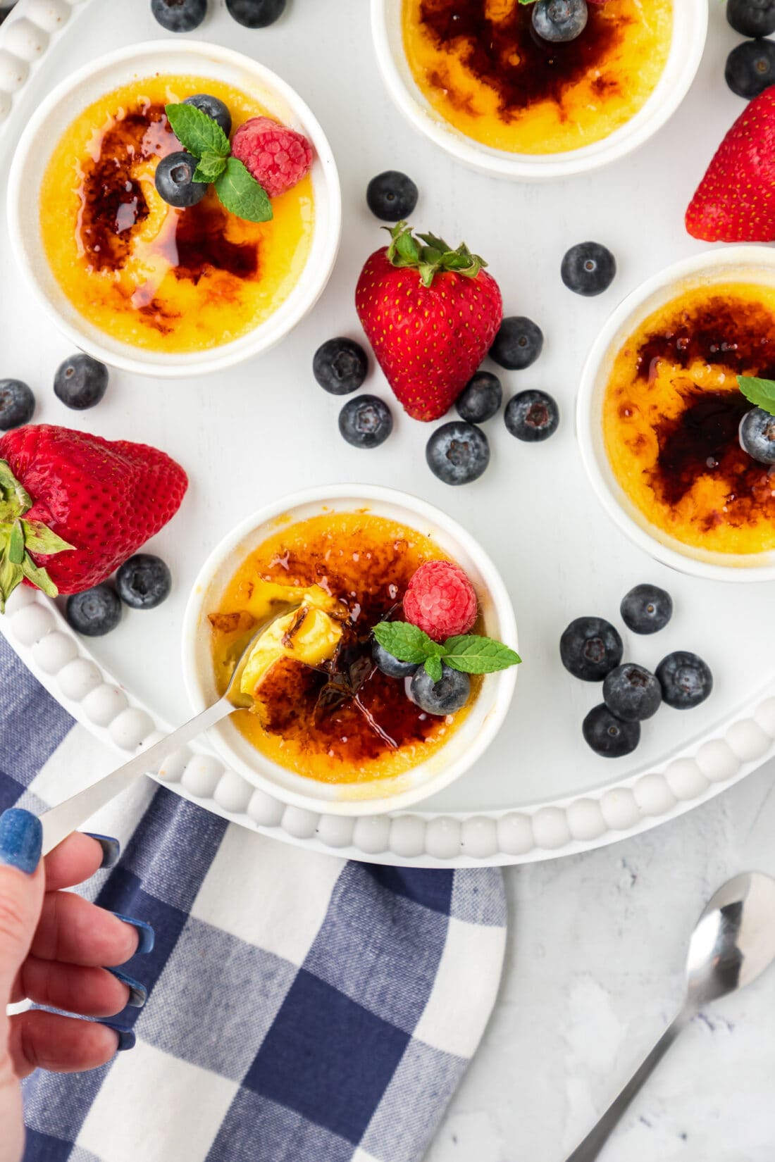 Spoon dipping into a Creme Brulee