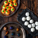 Assorted Halloween Oreo Truffles on decorative trays