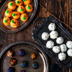 Assorted Halloween Oreo Truffles on decorative trays