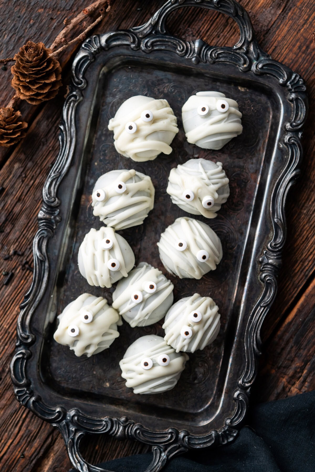 Mummy Oreo Truffles on a black tray