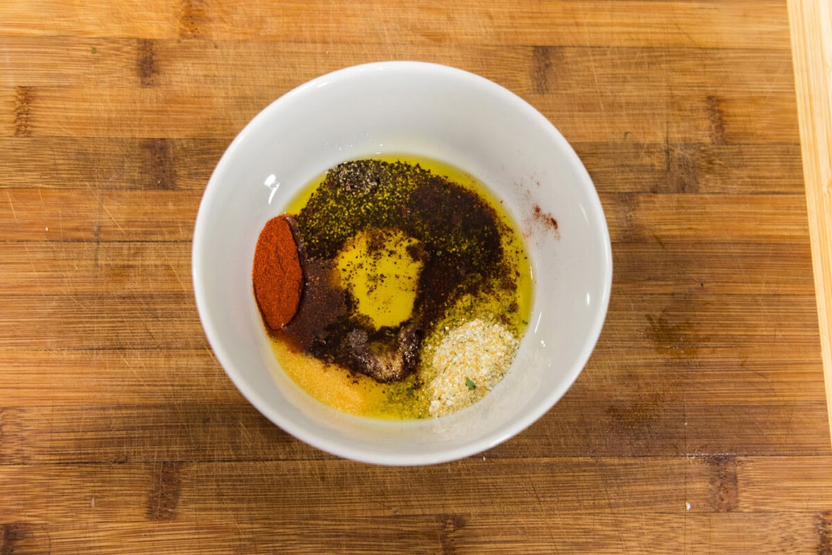 seasonings in a bowl with olive oil