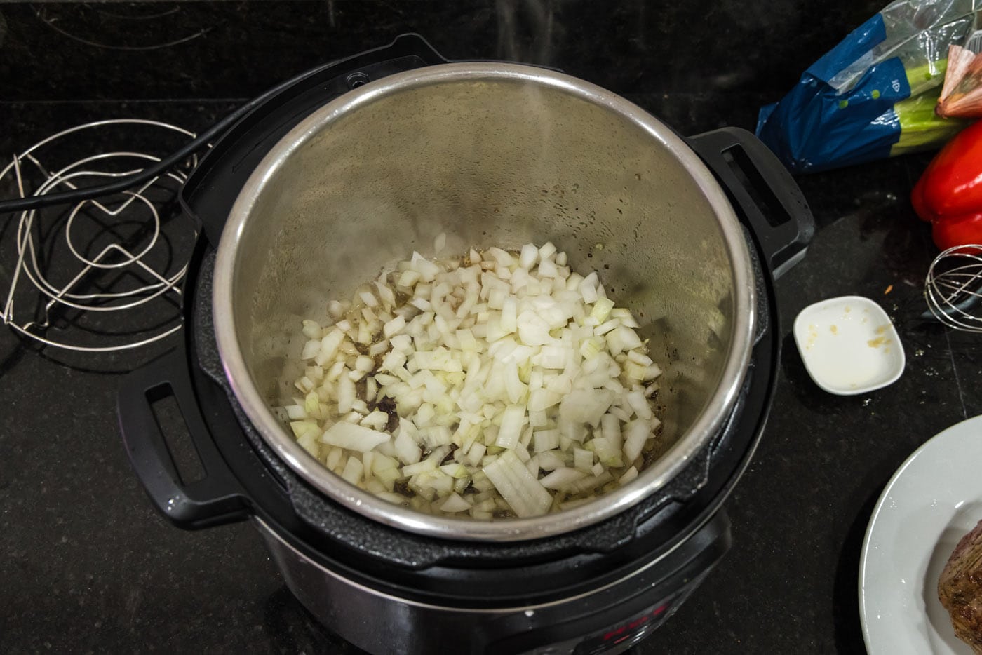 onion and garlic added to instant pot