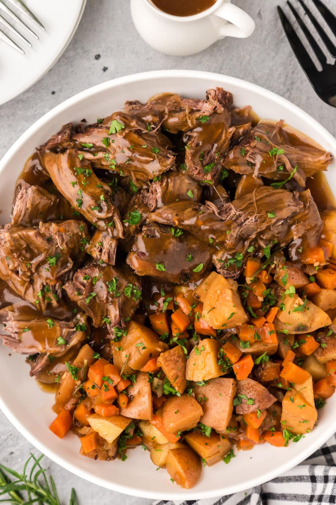 Bowl of Instant Pot Roast Beef with potatoes and carrots
