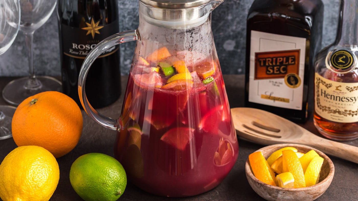 Mexican Sangria is the perfect sidekick to spicy main courses with a punch of sweet red wine, triple