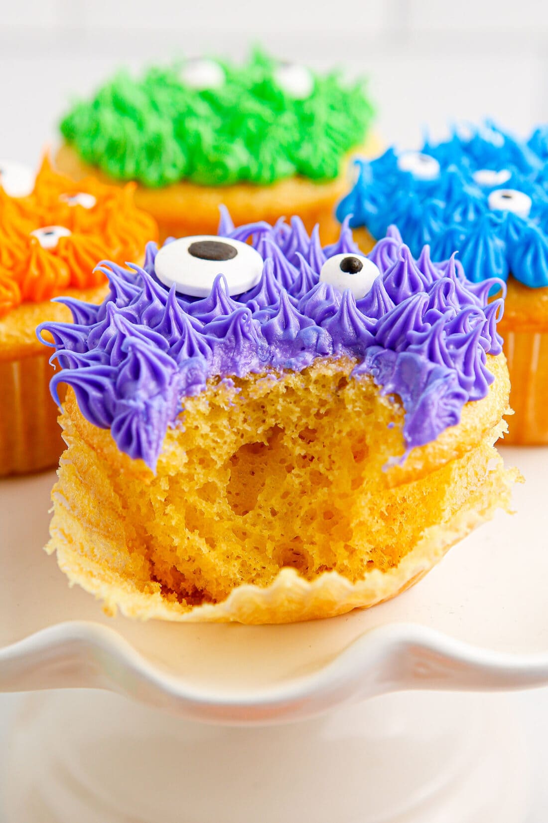 Close up photo of a bite taken out of a Monster Cupcake