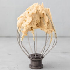 Peanut Butter Frosting on a whisk attachment