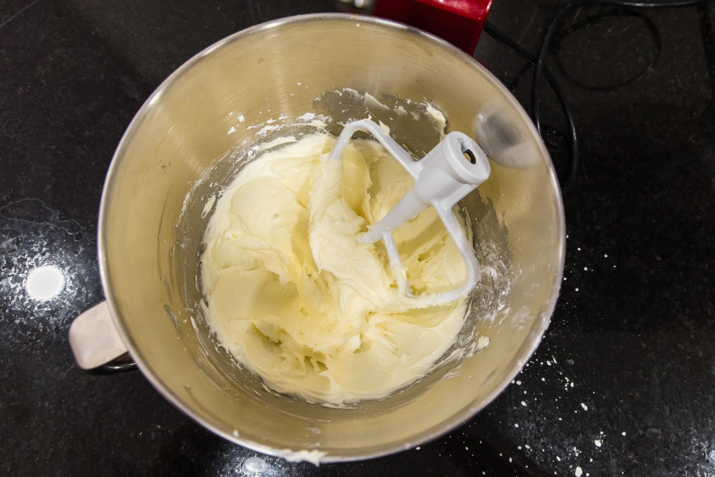 whipped sugar, cream cheese, and butter in a bowl
