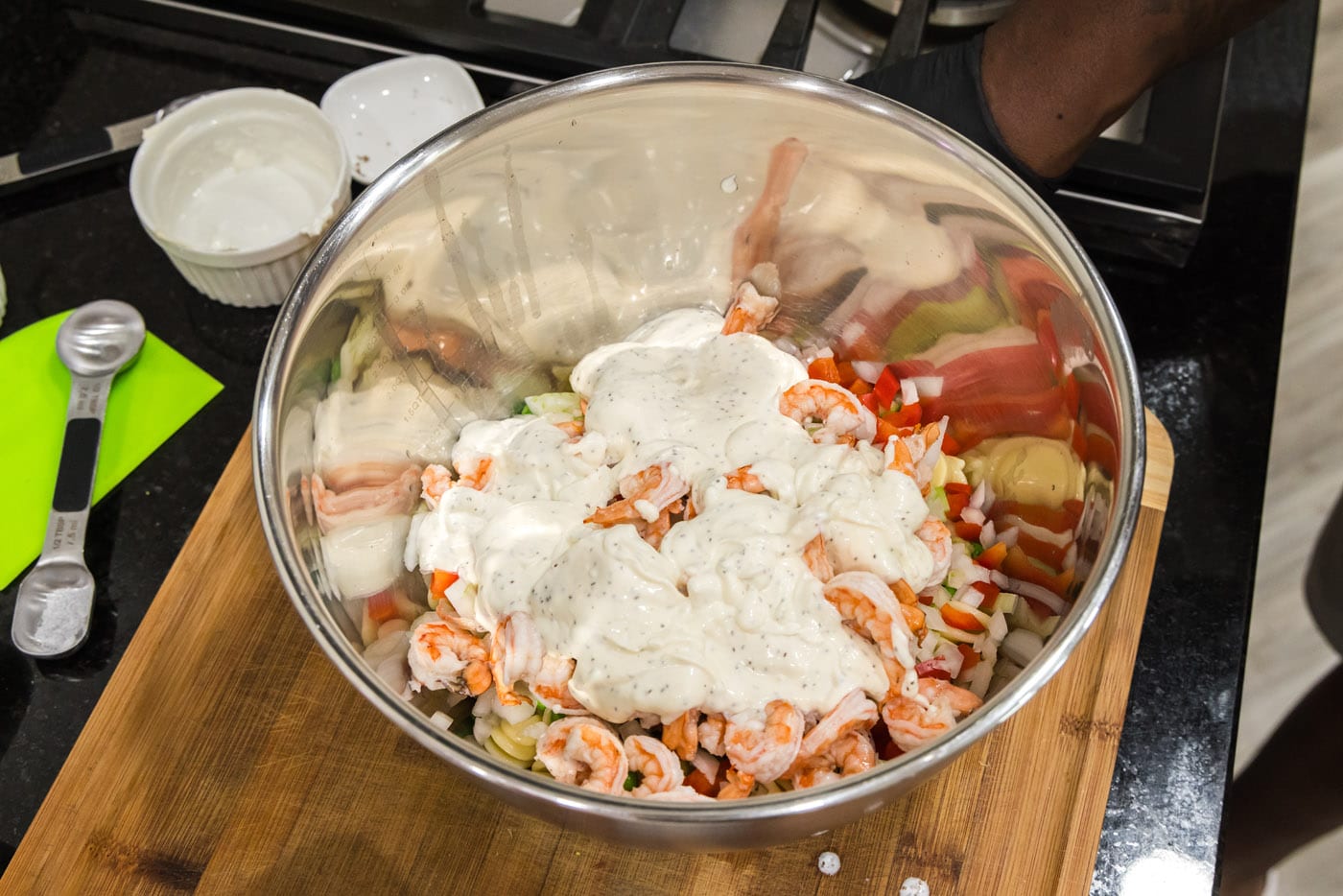 shrimp salad dressing added to pasta, vegetables, and cooked shrimp