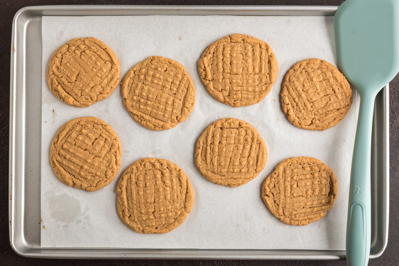 baked peanut butter cookies on a baking sheet