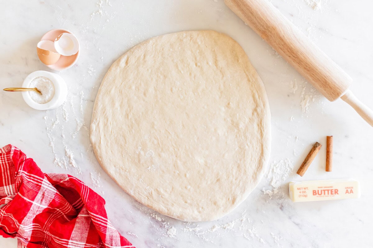 dough rolled flat on a surface