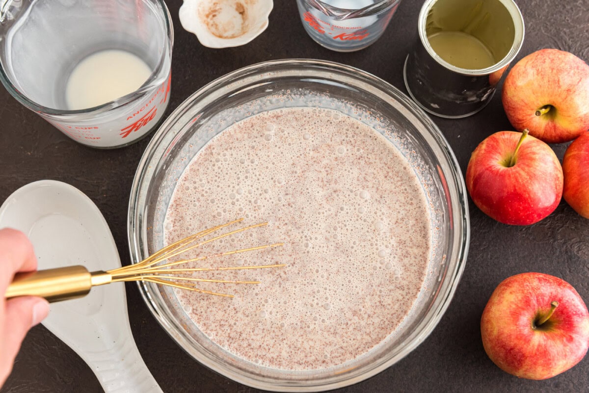 cinnamon and cream mixture whisked in a bowl