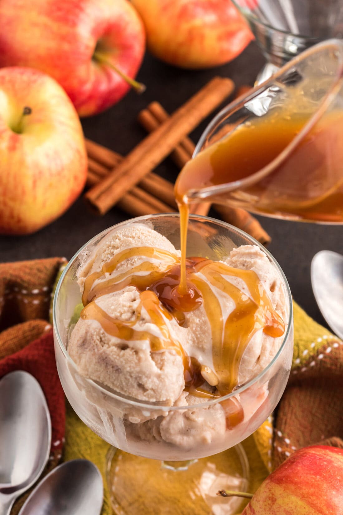 Caramel being drizzled over scoops of Apple Cider Ice Cream