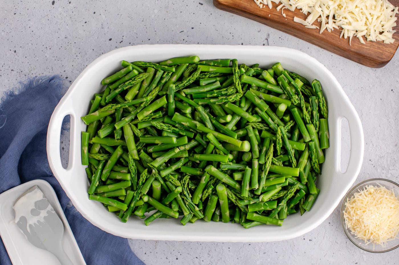 blanched asparagus in a casserole dish