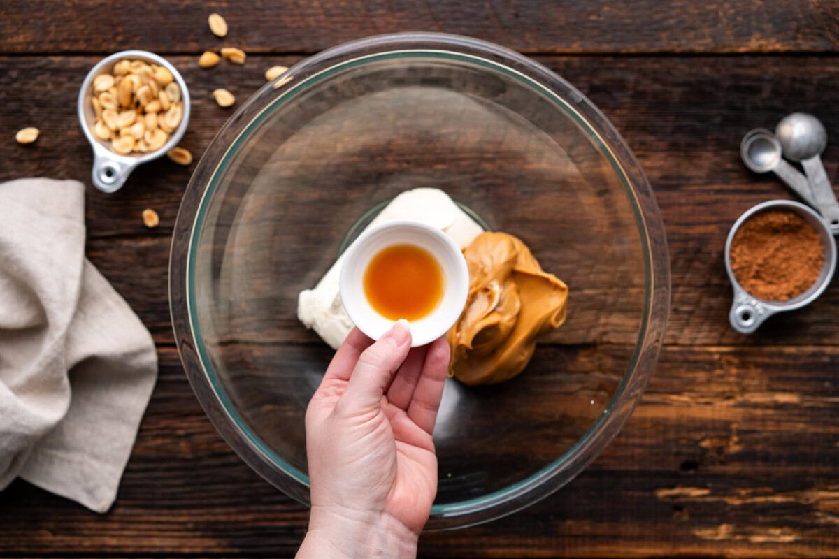 cream cheese, peanut butter, and vanilla in a bowl